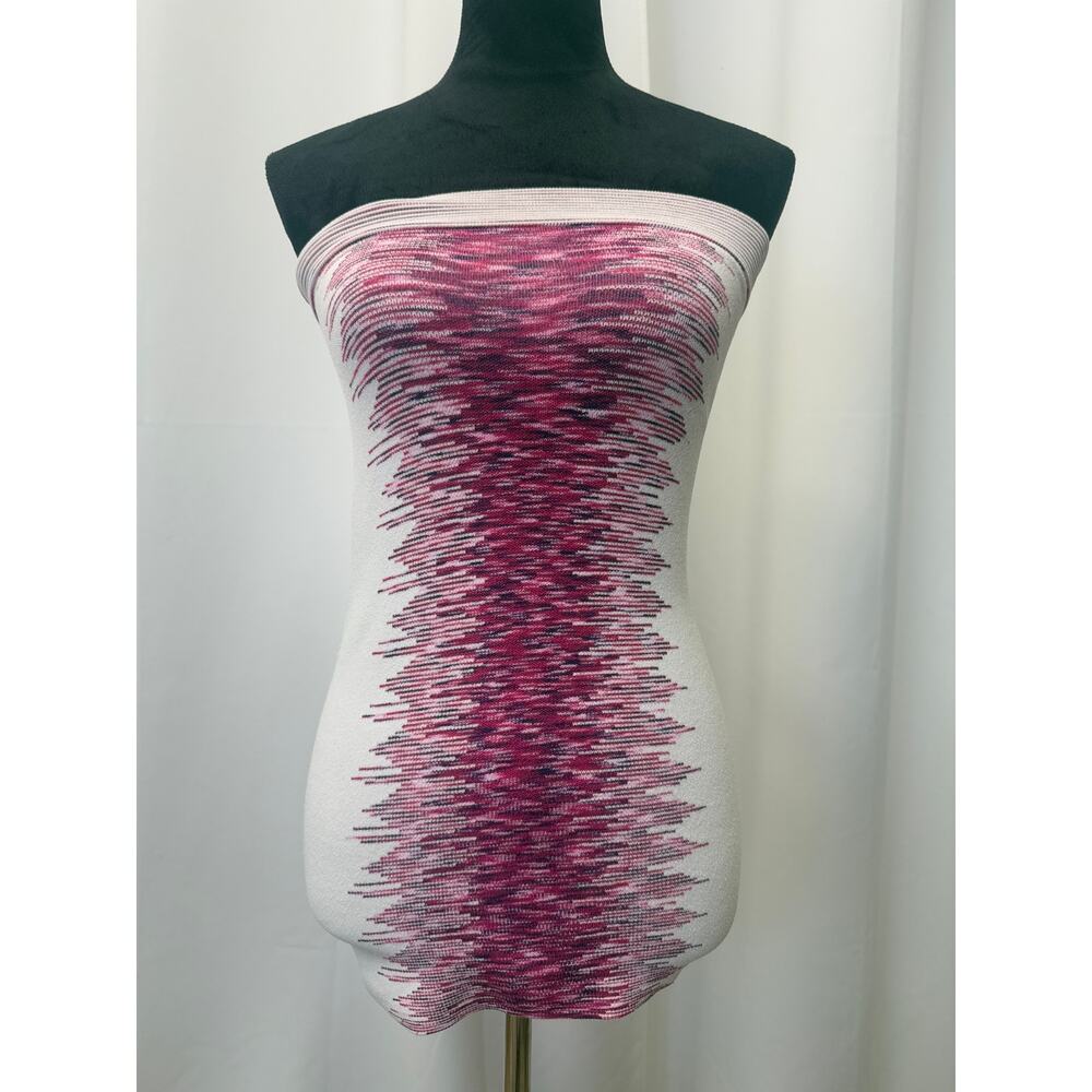 BEBE, I believe it’s a skirt, but could also be a tube top! 
Measurements below